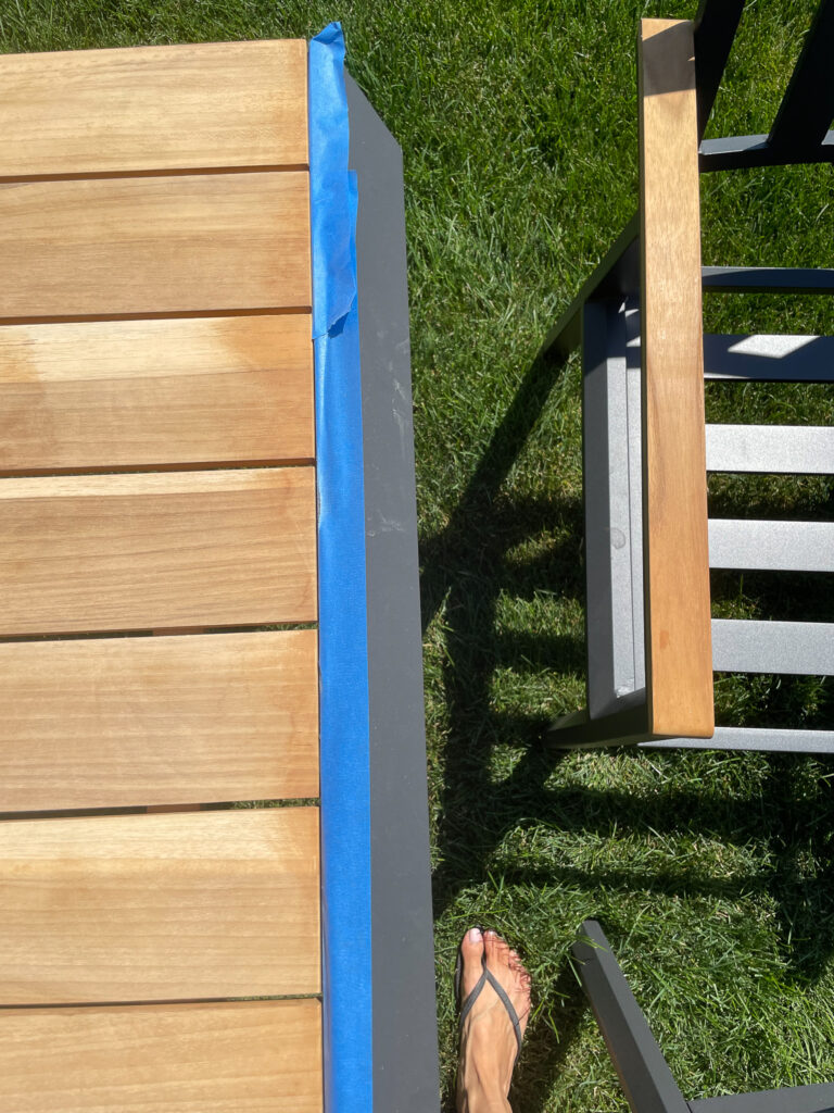 Samantha's outdoor patio table when sanded and chairs not sanded. The chairs have quite orange tones. Whereas the sanded table the orange is removed.