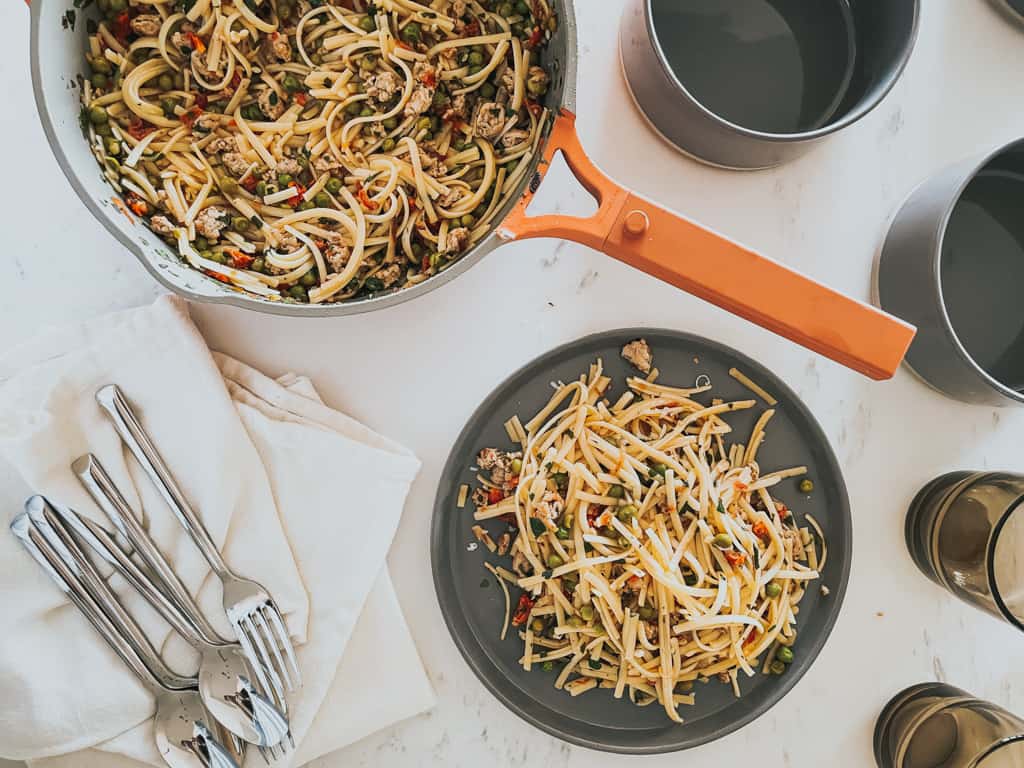 Our place always pan filled with a bowl full of pasta. comparing it against the Caraway cookware set