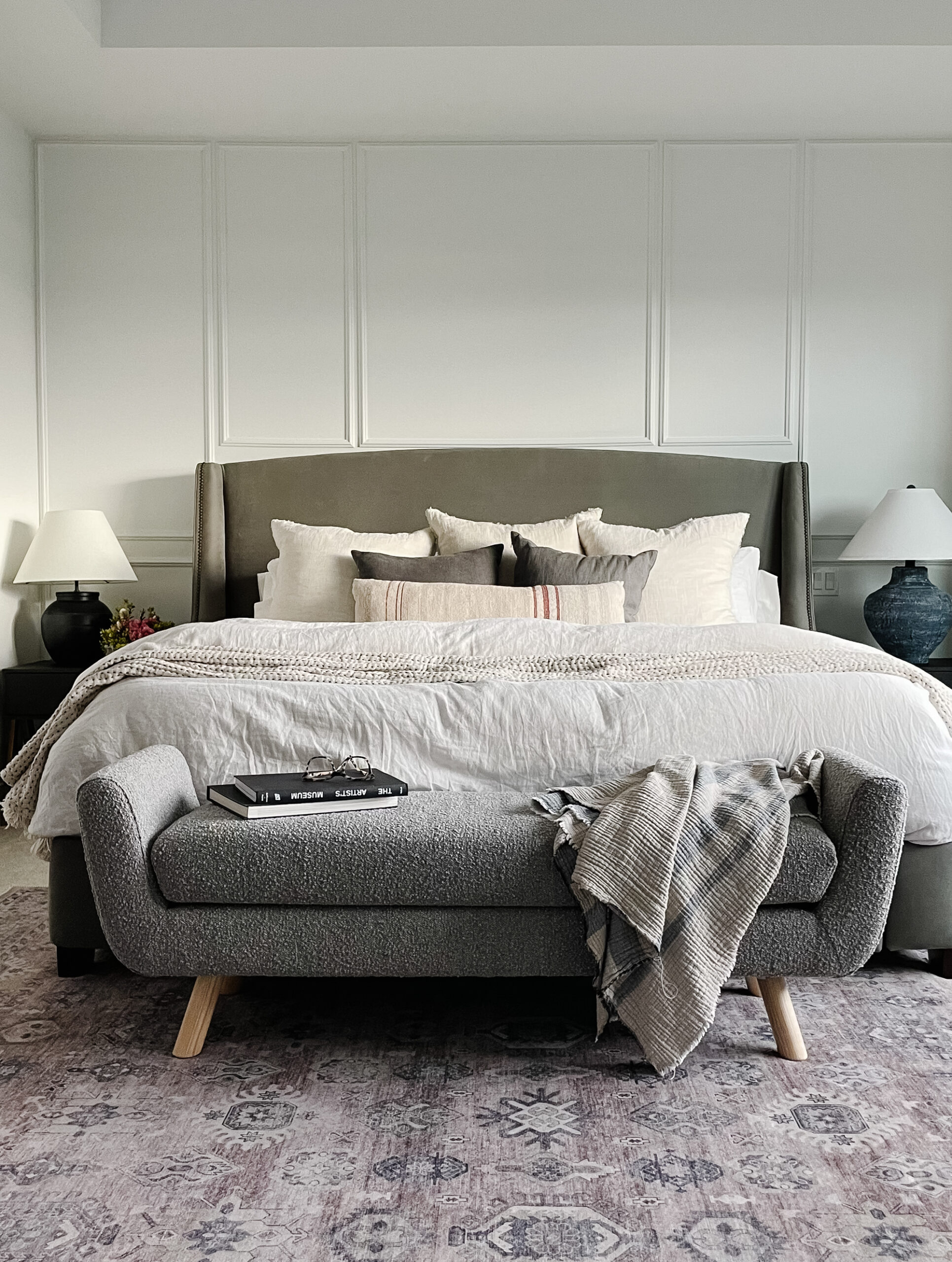 Signed Samantha's 2023 intentions include getting more rest when needed hence the bedroom pictured with a cozy bench at the end of the bed.