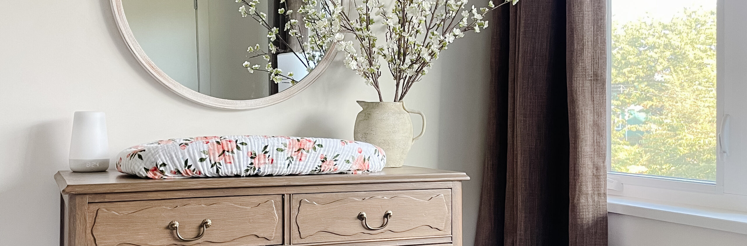 calming nursery reveal - part of the dresser and mirror. All in small spaces