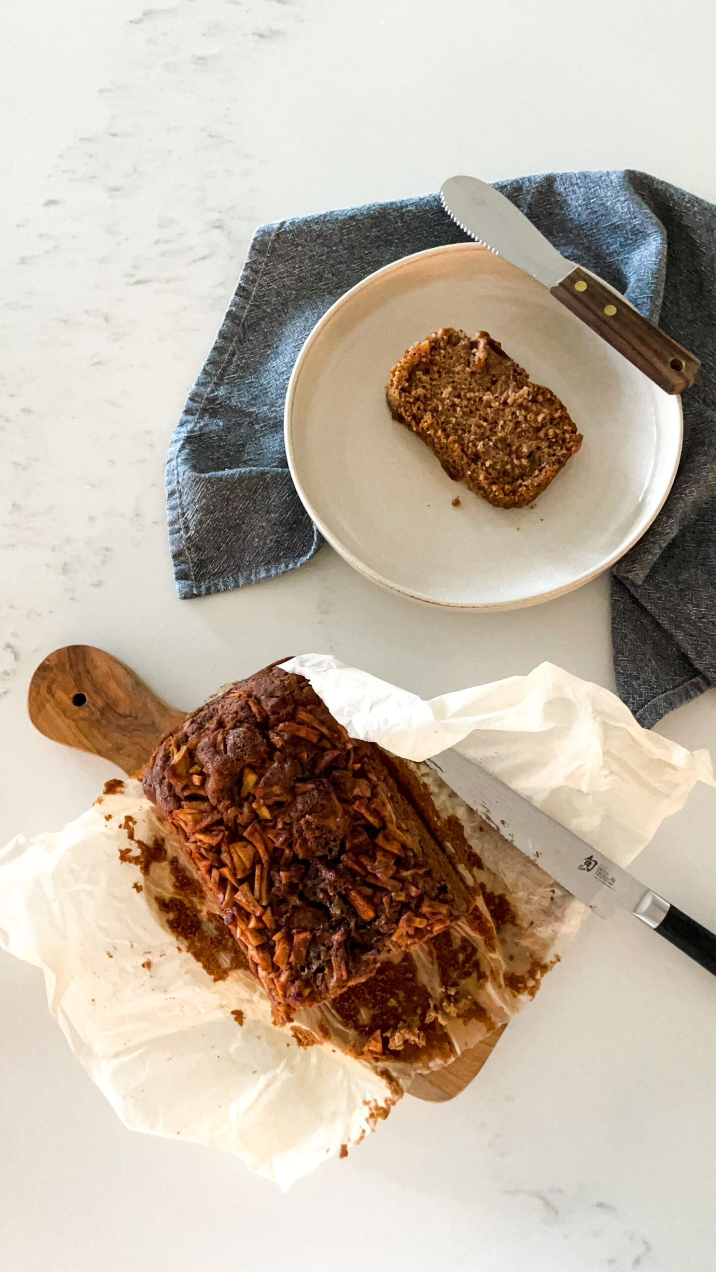 Apple Cinnamon Bread on a plate and on a cutting board