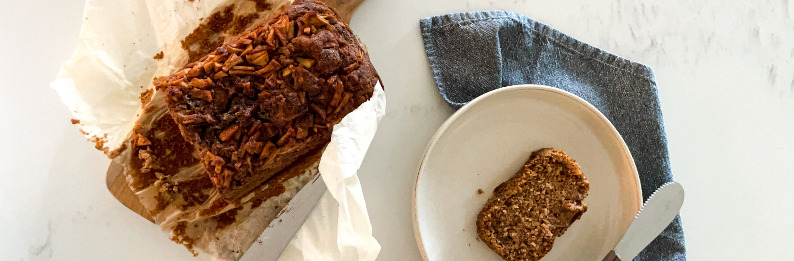Apple Cinnamon Bread on a plate and on a cutting board