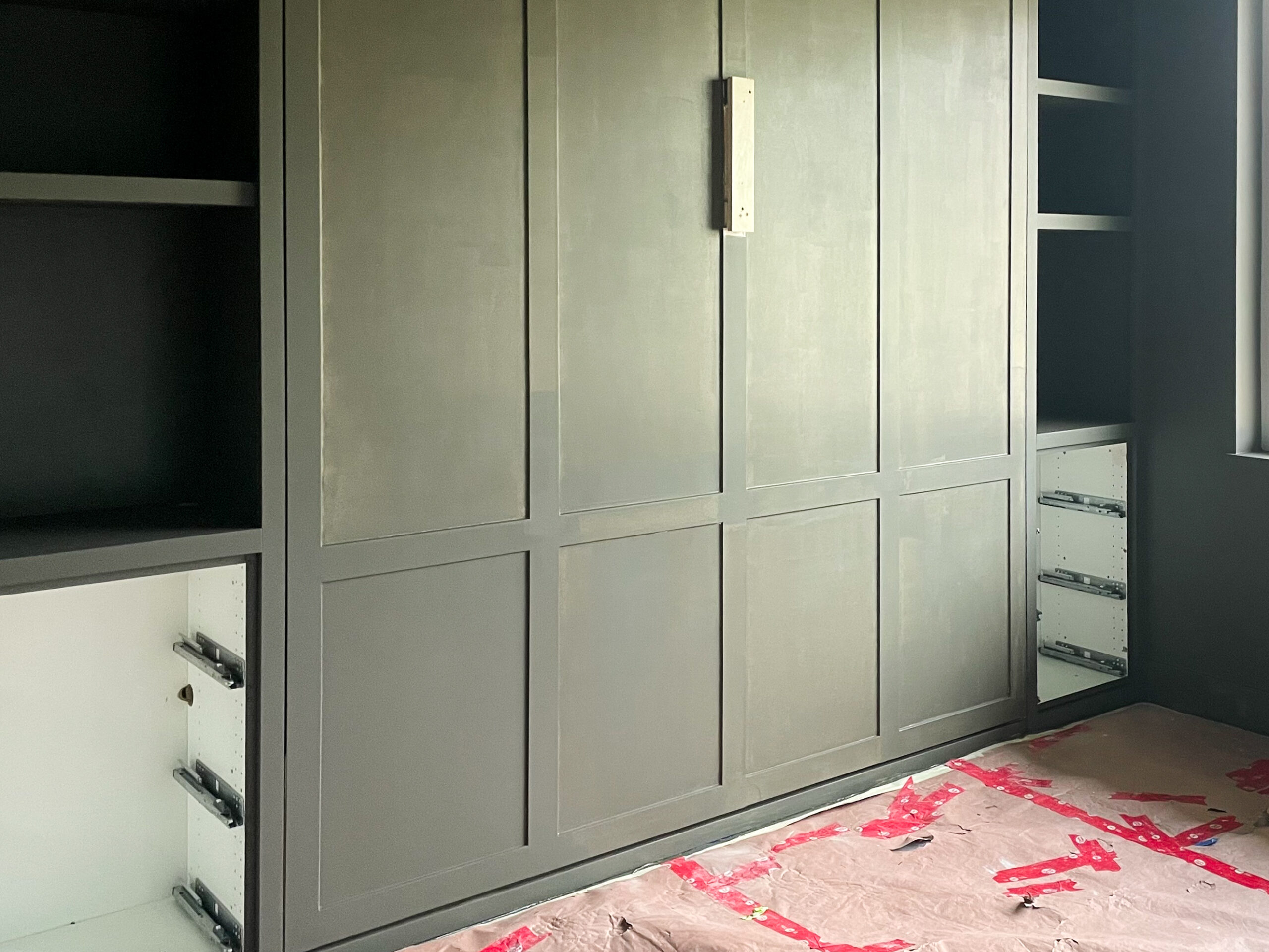 office paint colour for the built ins. The colour is a neutral green, sherwin williams urbane bronze