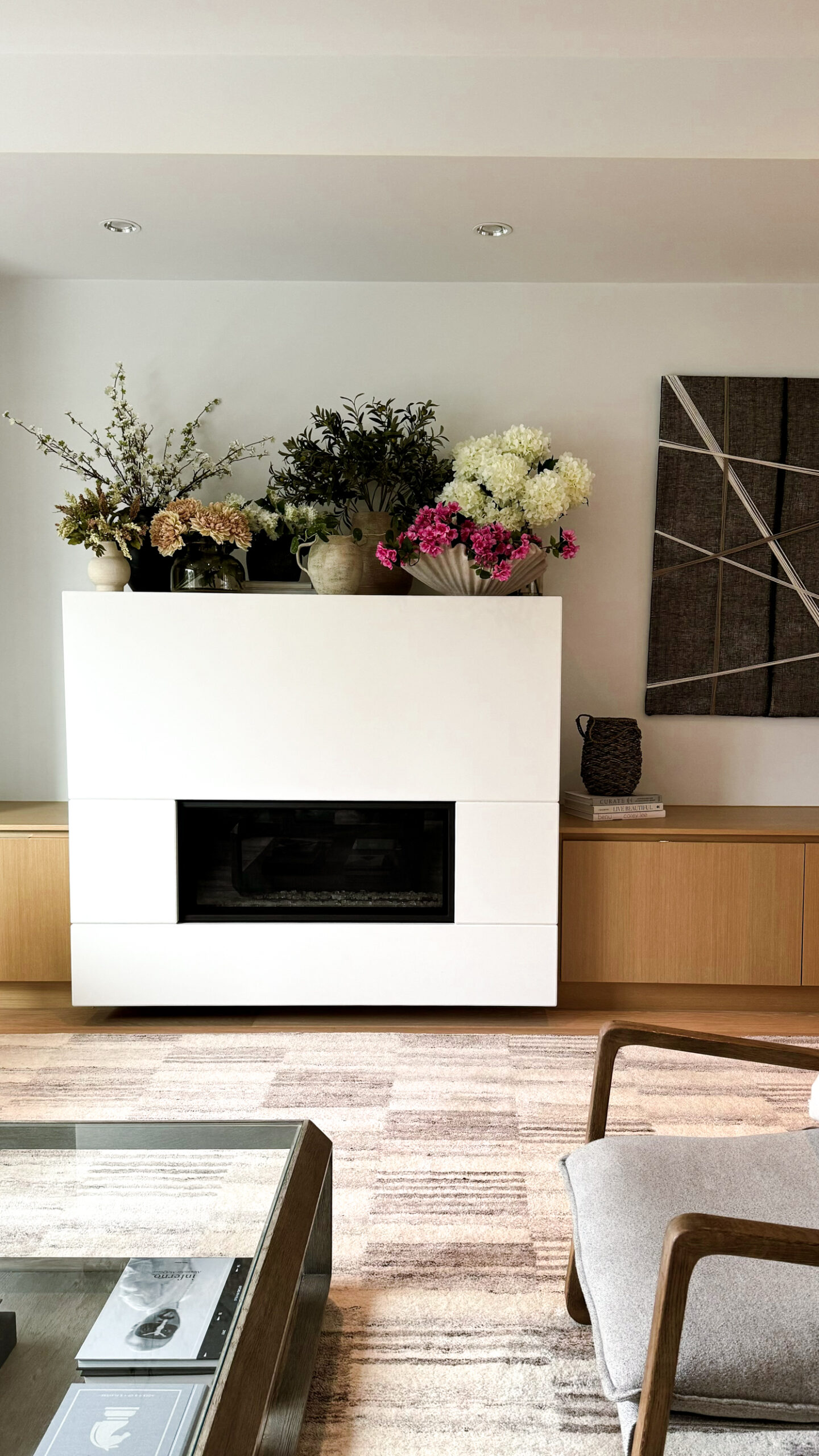 update your home decor with new florals which are all over a fireplace mantle