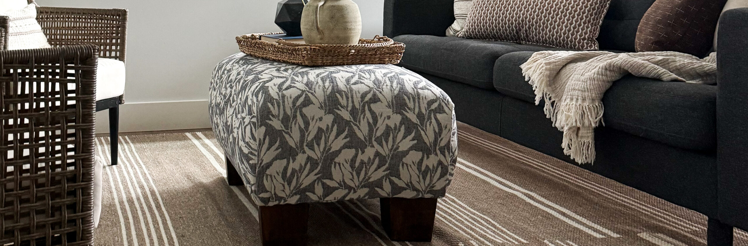 RugsUSA rug review - beautiful brown striped rug with an ottoman ontop