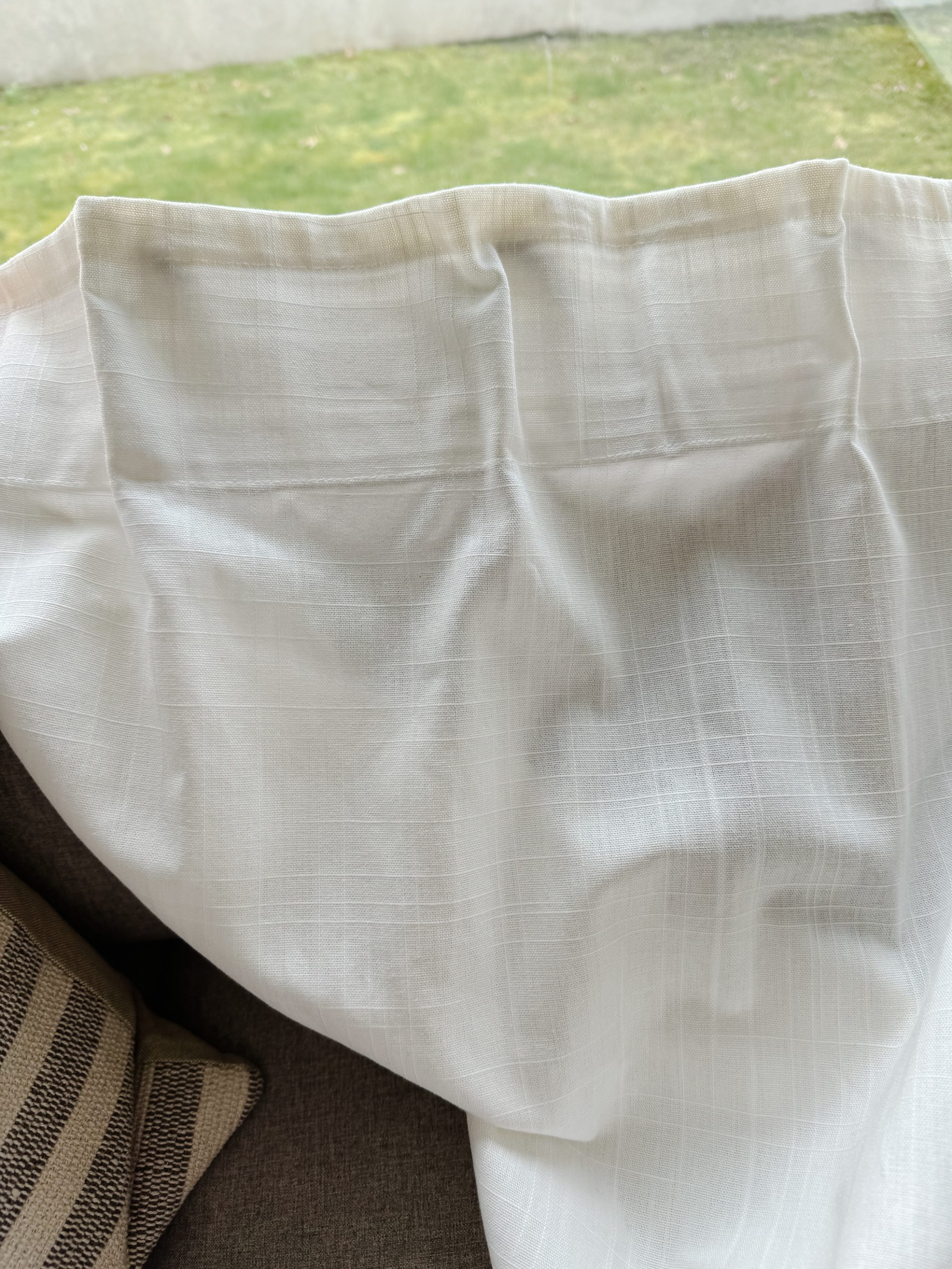 a pleated ikea curtain to help make them look high-end