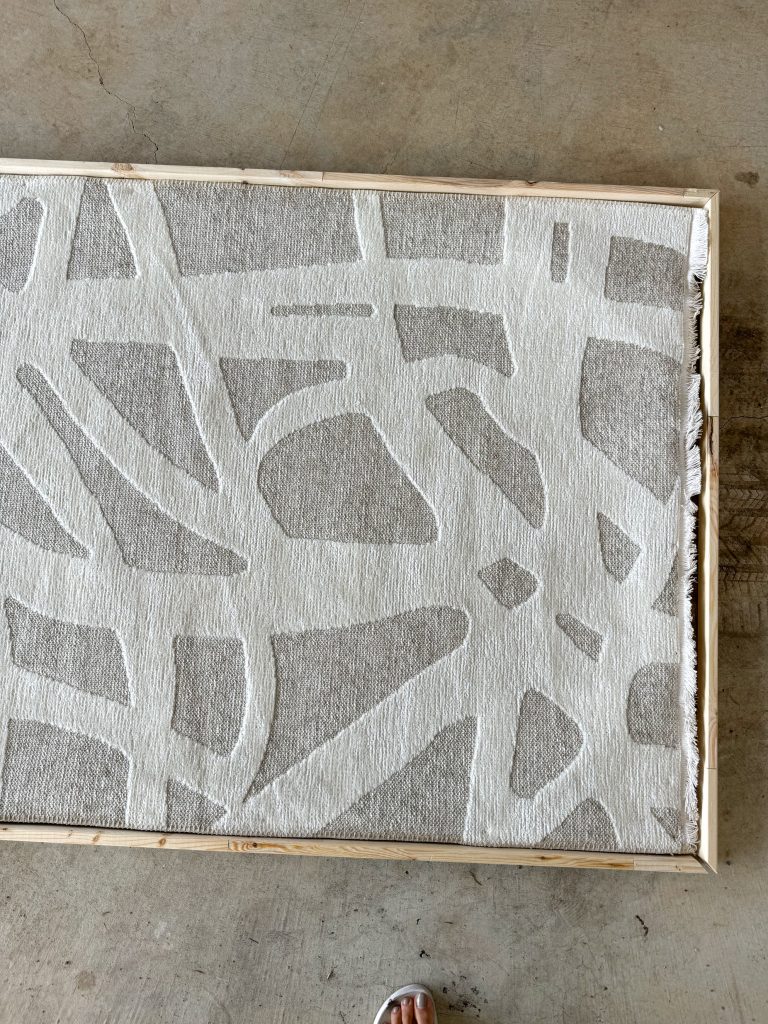 Floating frame around a rug