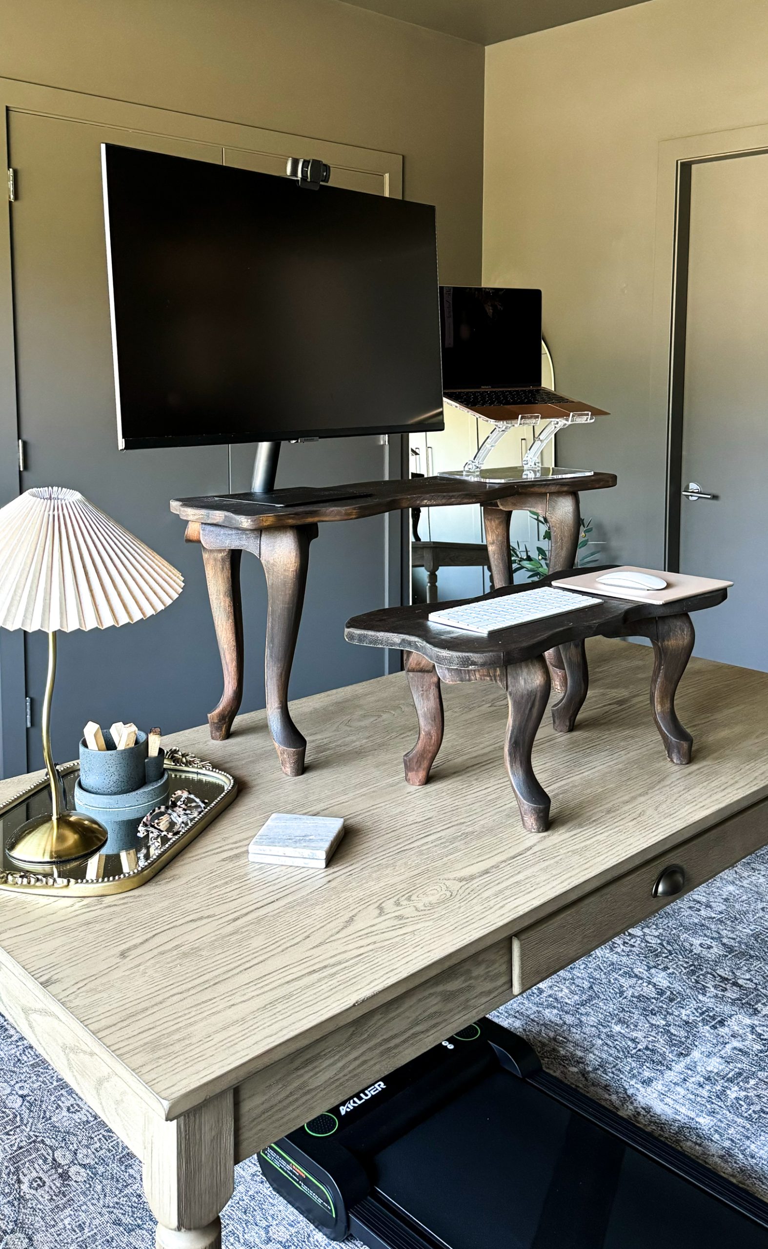 DIY Desk Riser - two of them. One with a laptop and computer monitor on top and one with a keyboard on top. They are sitting on top of a desk.