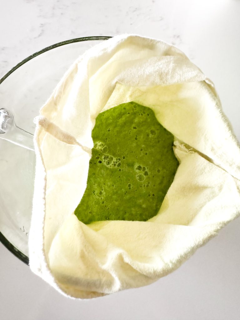 green juice in a nut bag cloth