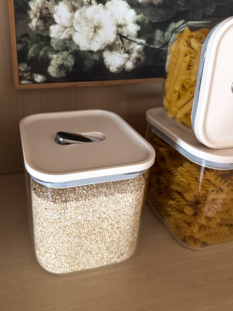 Caraway Glass Airtight Container open on the counter