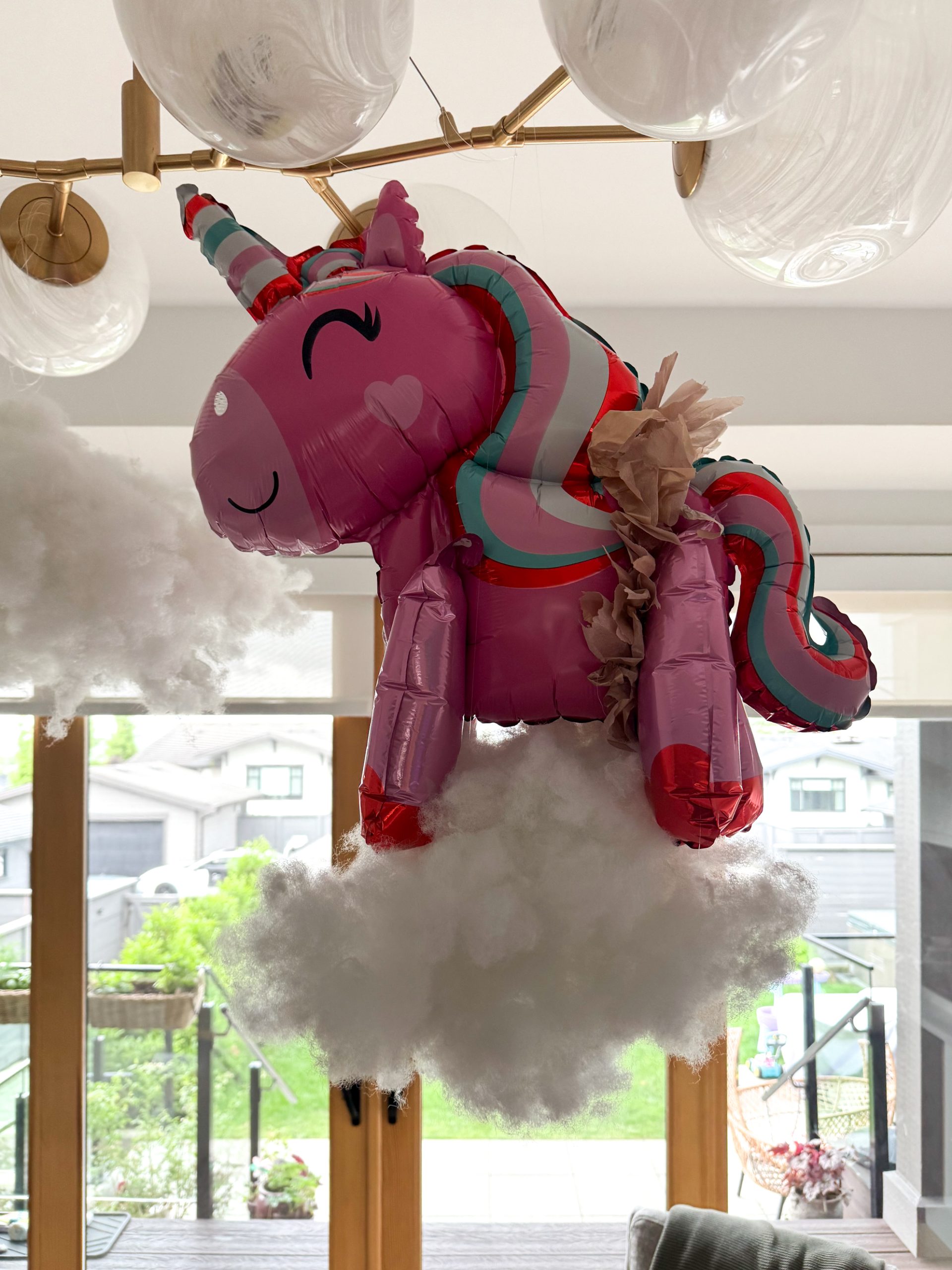 unicorn ballerina standing on a cloud